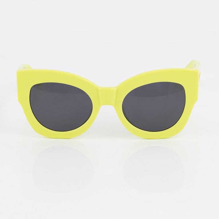 Karen Walker, a pair of neon green "Northern lights" sunglasses.