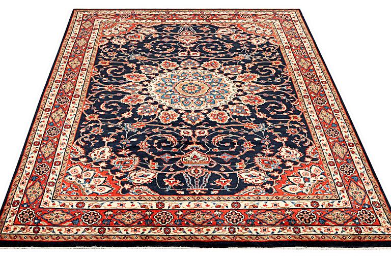 A Hamadan carpet, c. 312 x 216 cm.