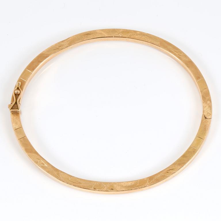 ARMBAND, 18 k guld. Vikt ca 8,76 g.