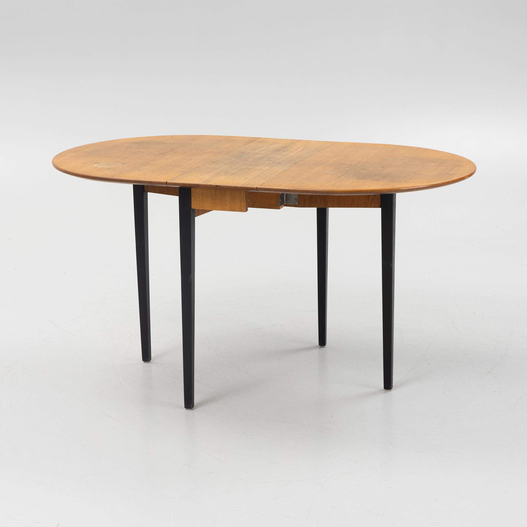 A gate-leg table, mid 20th Century.