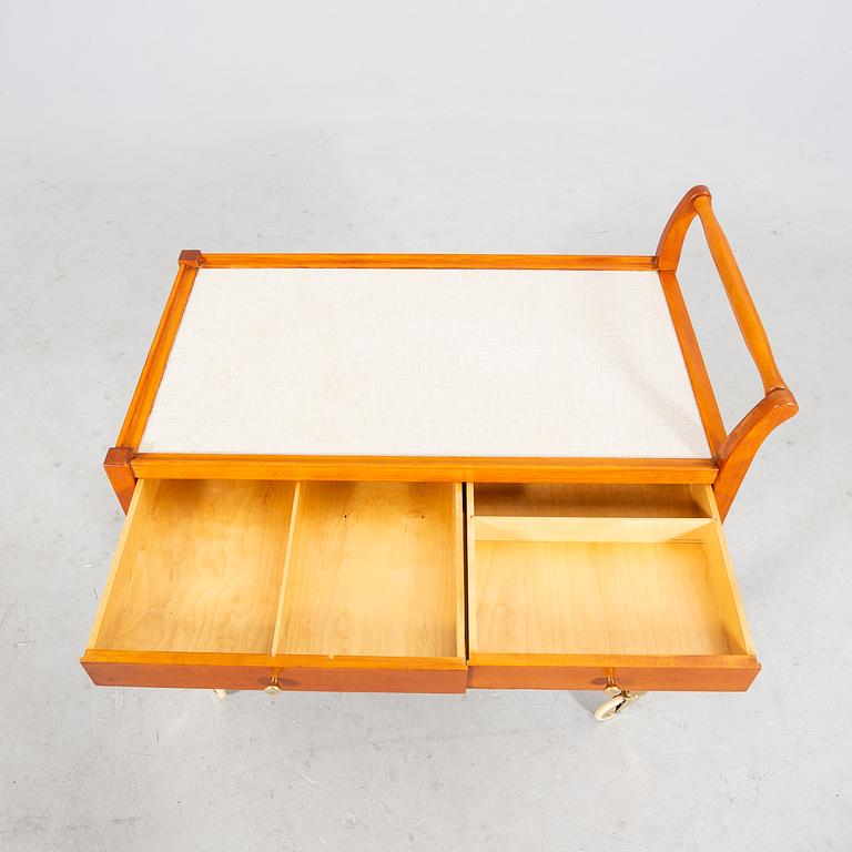 A beech and laminate 'Triva' drinks trolley from Nordiska Kompaniet 1949.