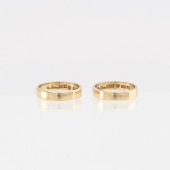 Wiwen Nilsson, a pair of 18K gold rings with a box shaped like a hymn book, Lund 1970.