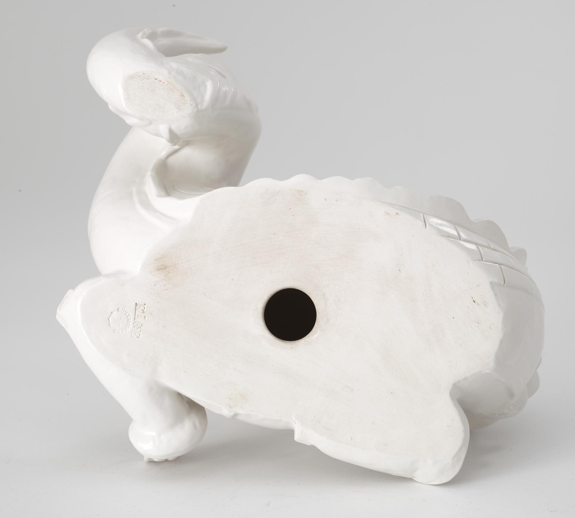 A Wilhelm Kåge stoneware figure of a dragon, Gustavsberg circa 1940.