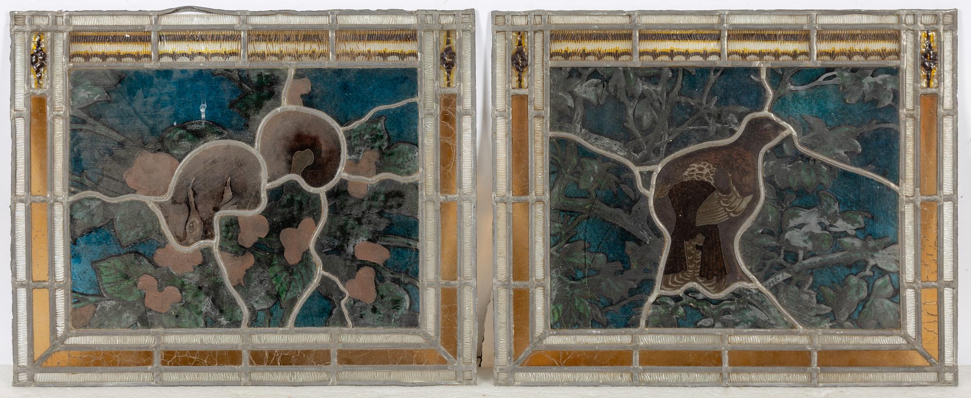 A pair of stained glass windows, circa 1900.
