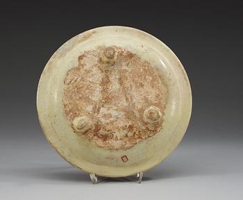 A sancai glazed tripod dish, Tang dynasty, (618-907 AD.).