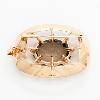 Helge Narsakka, riipus/rintaneula, 14K kultaa, savukvartsi, 1965.