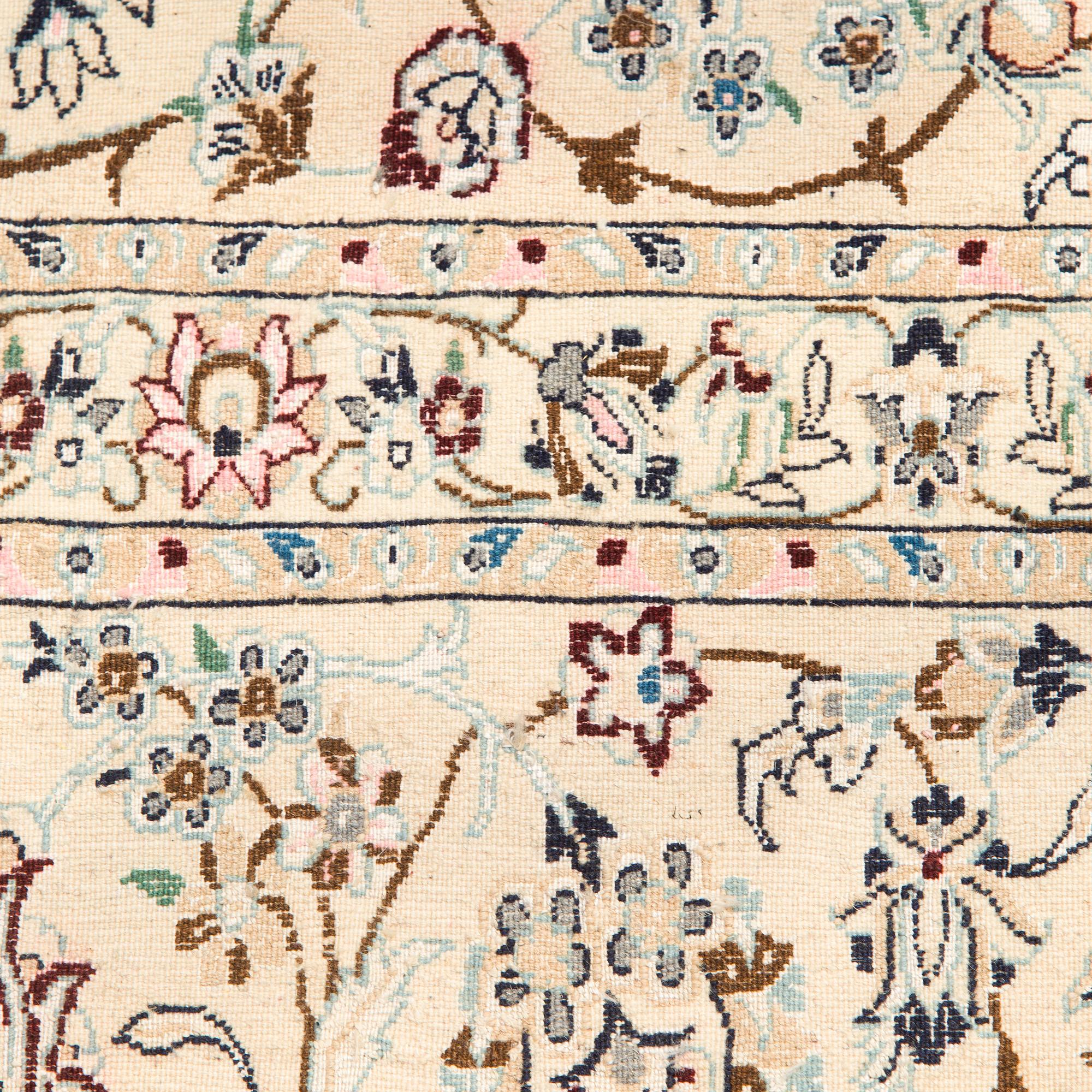 A carpet, Nain, part silk s.k 9LAA. Circa 376 x 249 cm.