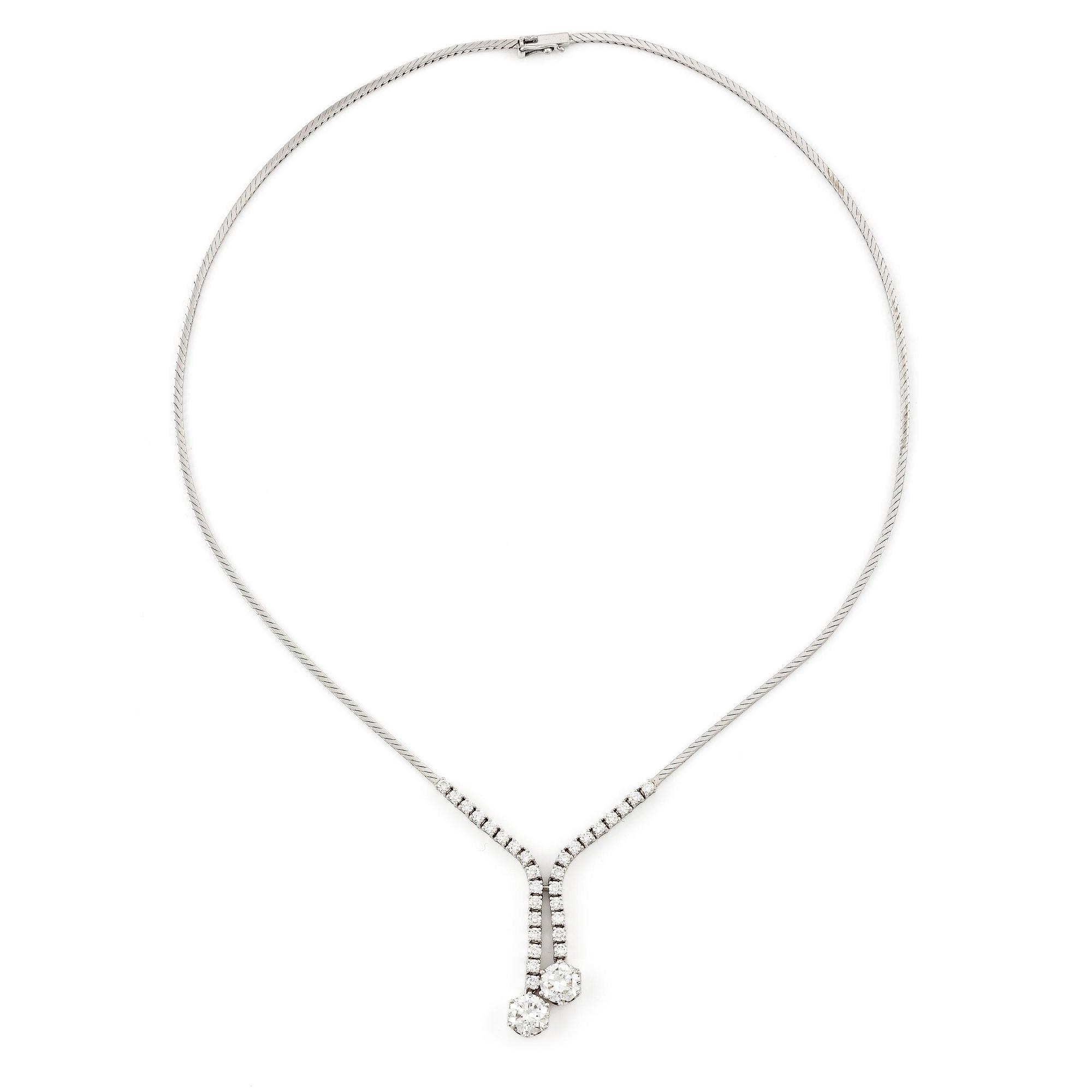 An 18K white gold necklace set with round brilliant-cut diamonds.