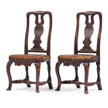 232. A pair of late baroque faux bois-painted chairs, attributed to M. Meling, 1730/40's.
