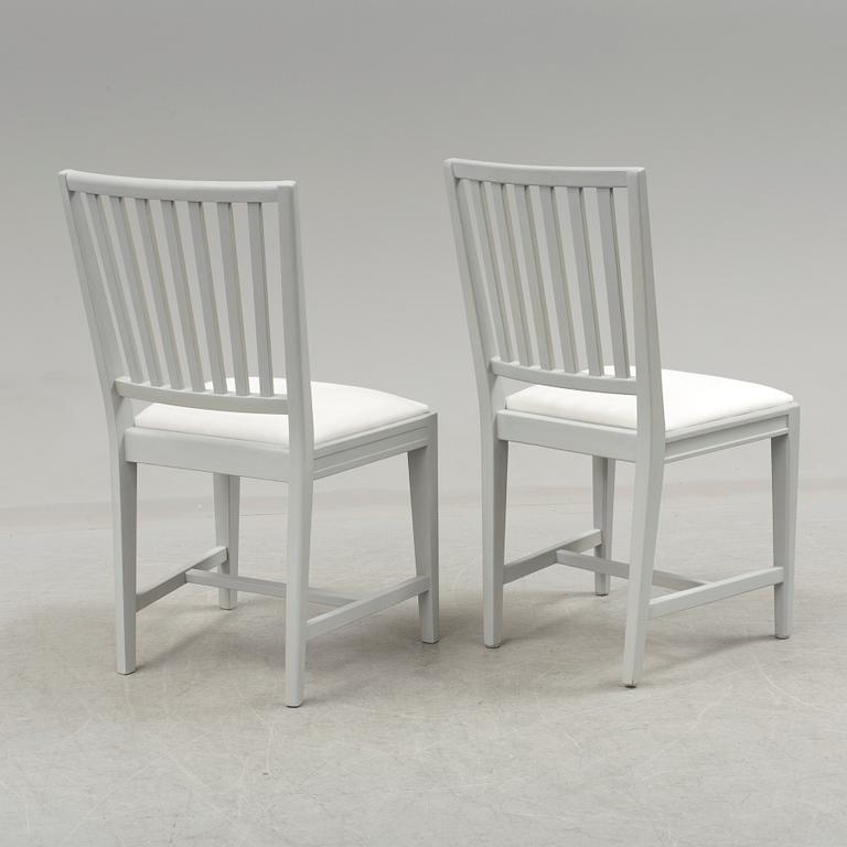 A set of eight 21st century chairs.