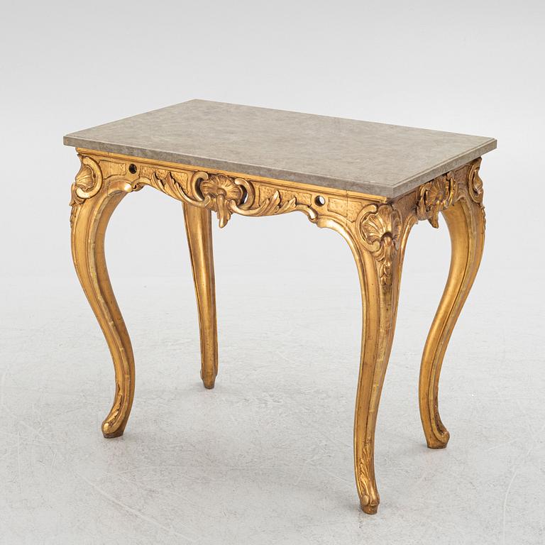 A Swedish rococo-style giltwood table, Stockholm, 19th century.