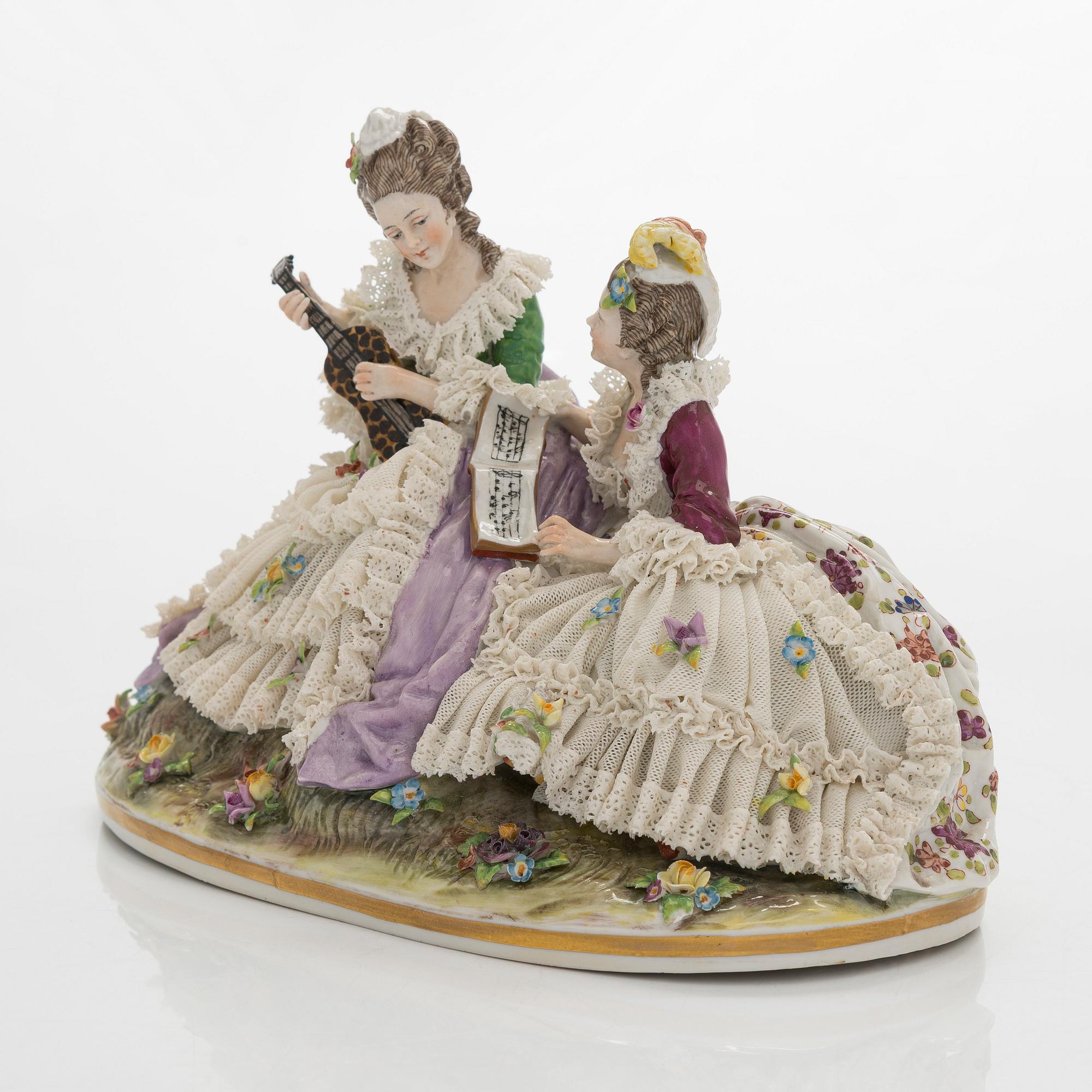 A porcelain lace figurine, Naples style mark, the 20th century.