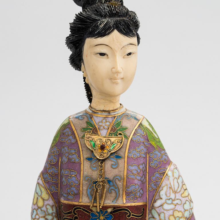 A cloisonné enamel Figurin from China, 1900s.