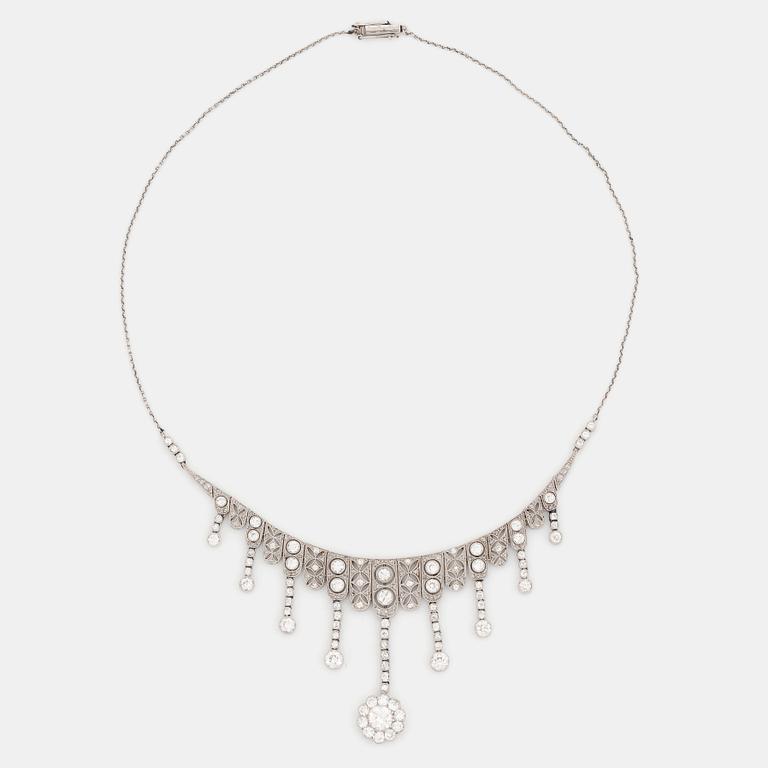 A platinum necklace set with old- and rose-cut diamonds.