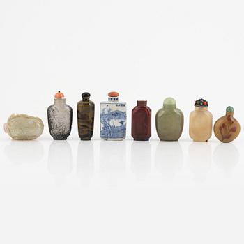 A group of 8 Chinese snuff bottles, 20th Century.