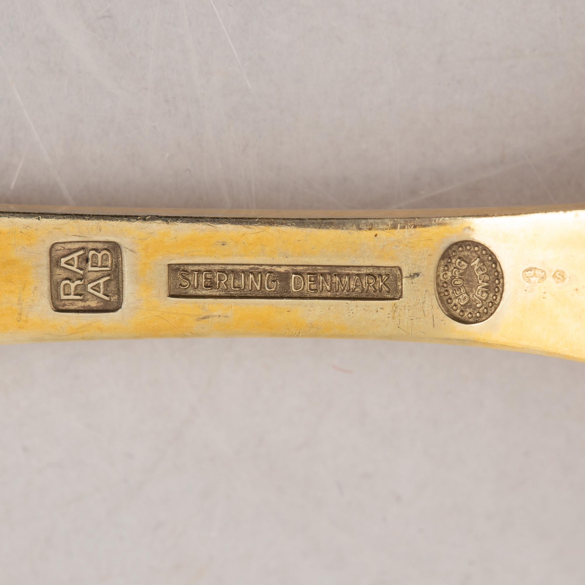 Georg Jensen, Christmas spoons/annual spoons, 13 pcs, gilded silver, Denmark 1971-1983.