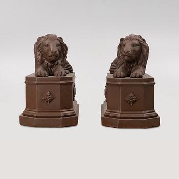 A pair of garden sculptures.