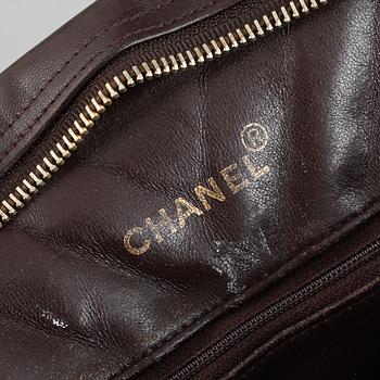 Chanel, a burgundy leather handbag, 1989-91.