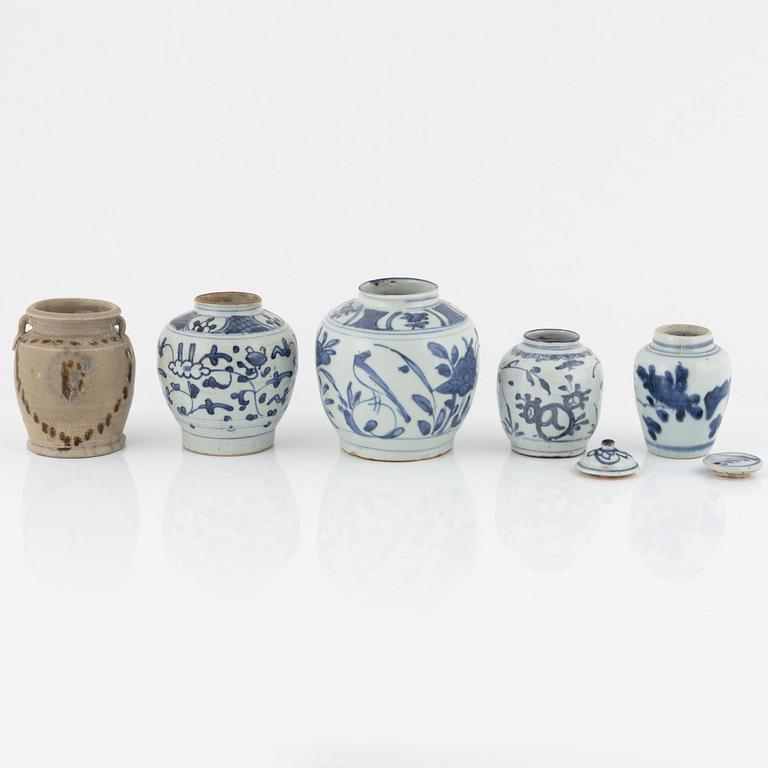 Five blue and white porcelain and ceramic urns, Ming dynasty, (1368-1644).