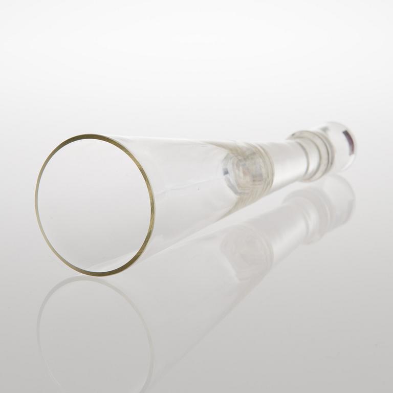 A GLASS CANDLESTICK, label marked Nuutajärvi Notsjö Boutique.