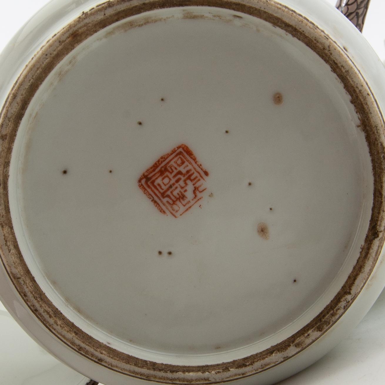 A set of three differently decorated tea pots with covers, Qing dynasty, 18century and 20th century.