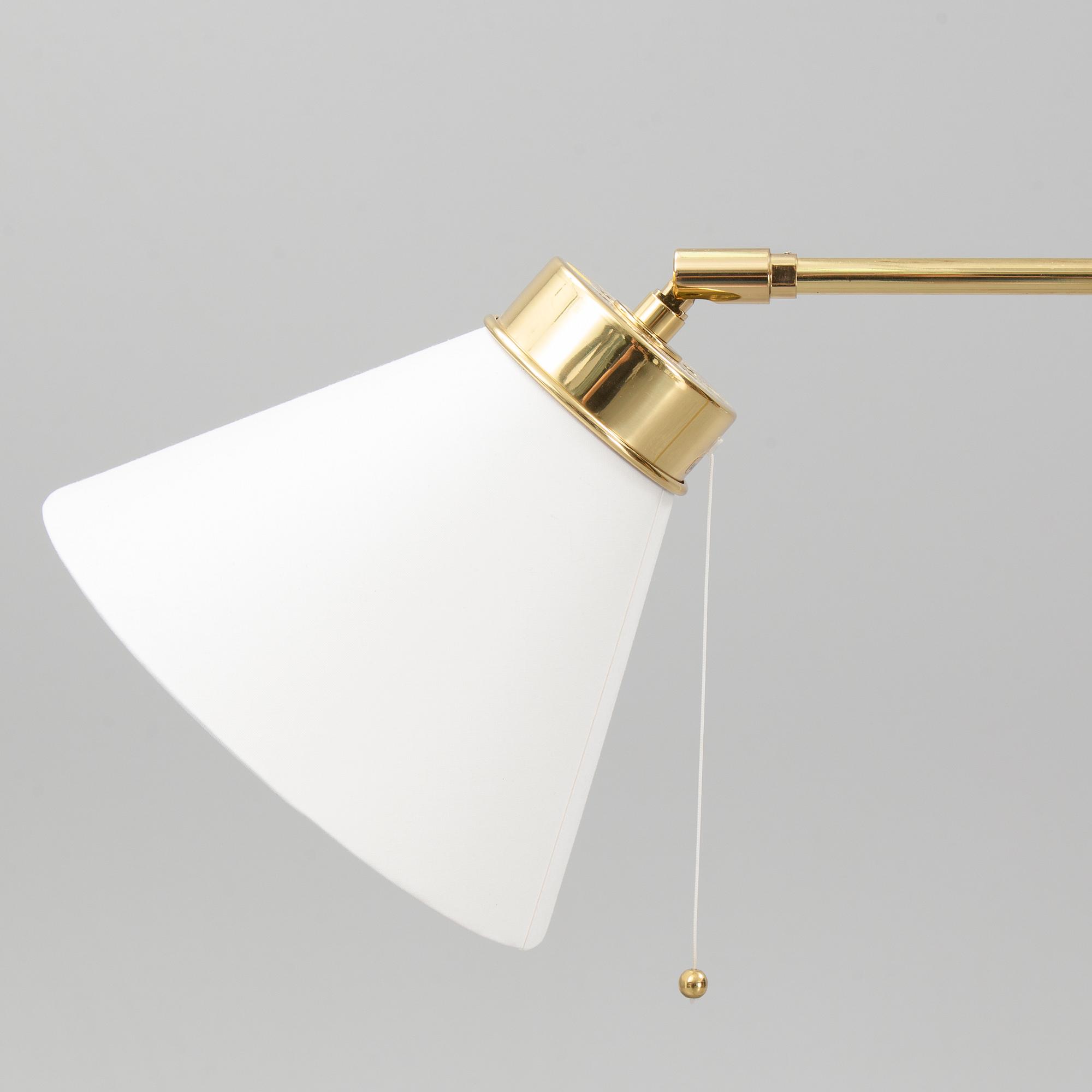 Josef Frank, a model 1842 brass floor light for Firma Svenskt Tenn.