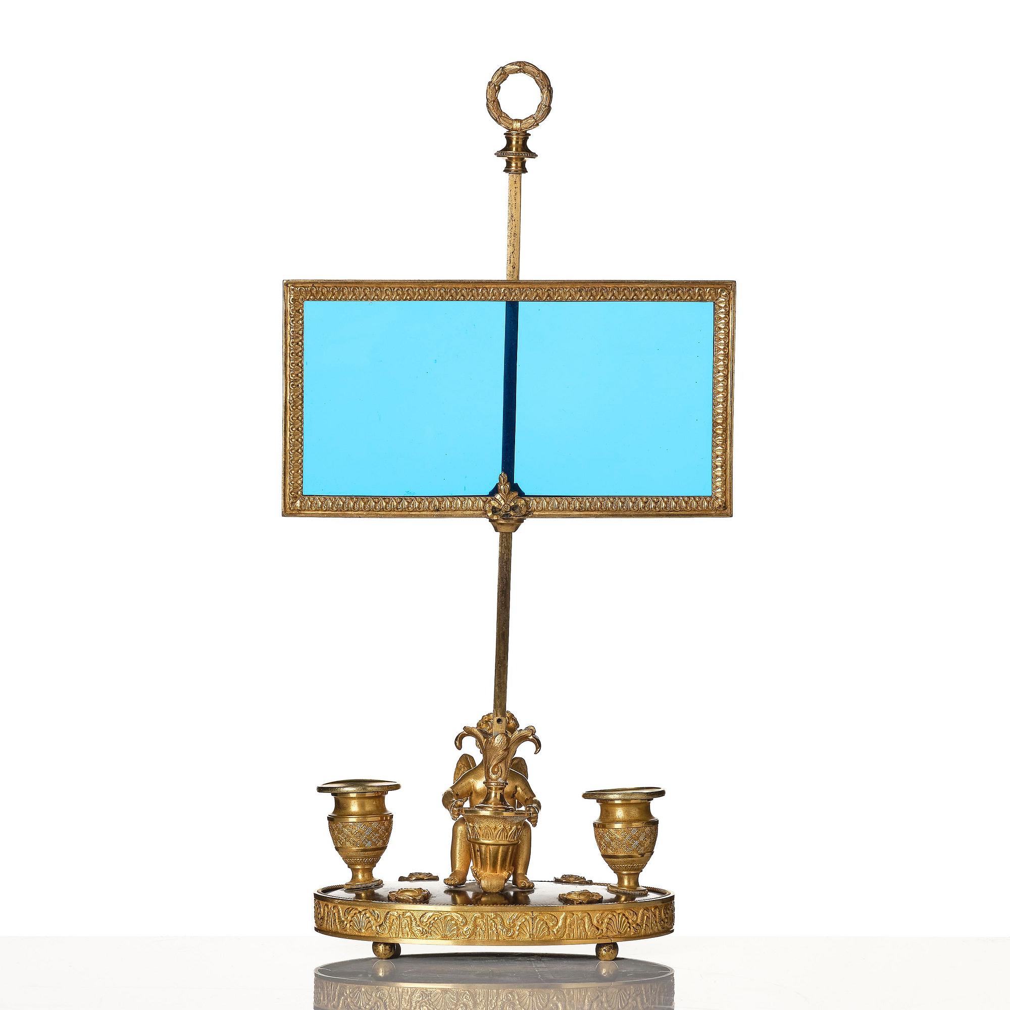 A Russian Empire ormolu and patinated bronse two-light lamp, early 19th century.