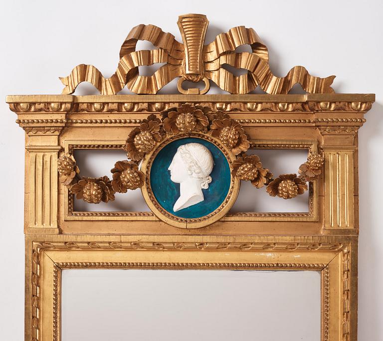 A Gustavian giltwood mirror by C. G. Fyrwald (master in Stockholm 1776-1825).