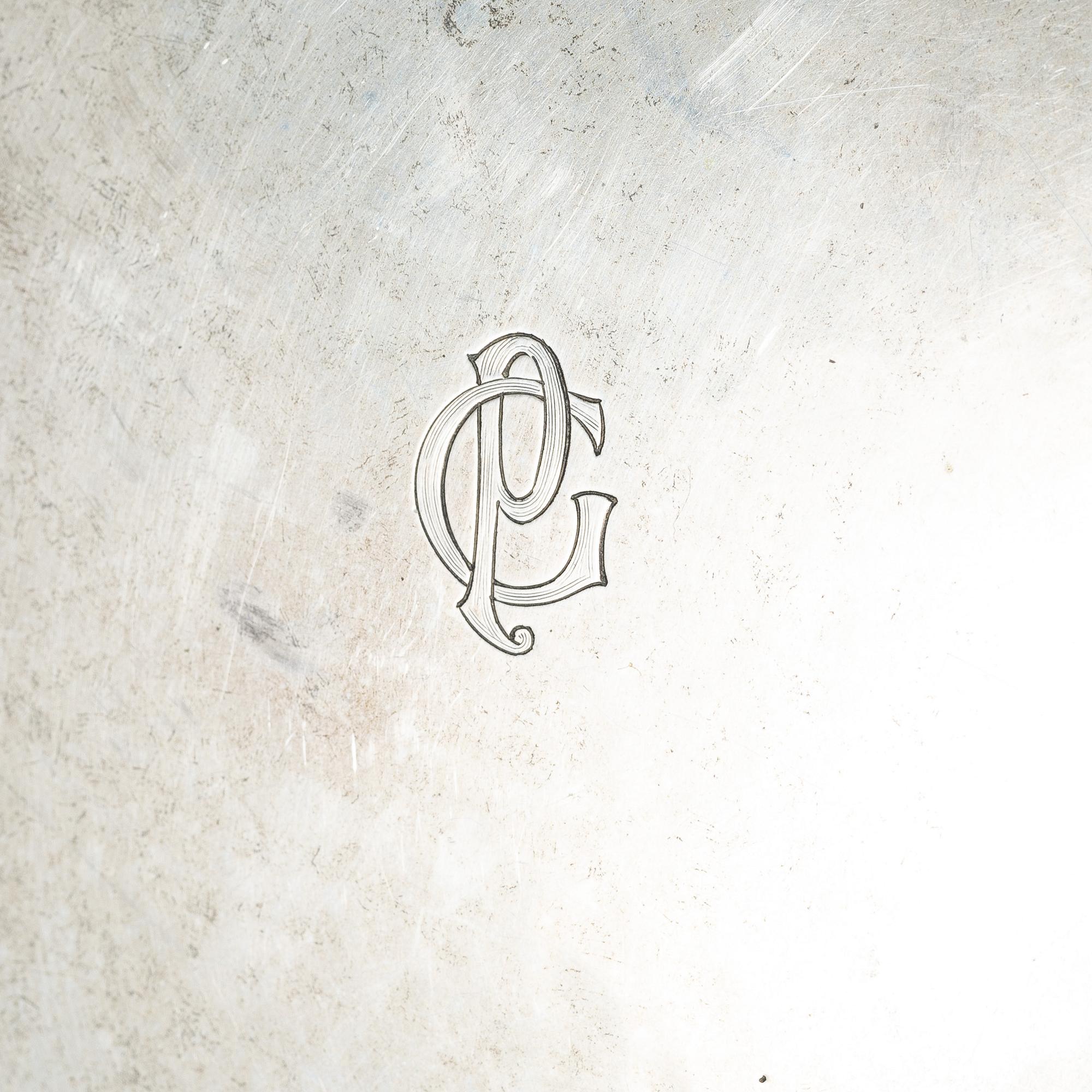 A K.Andersson silver and cut glass 'toilette set', monogrammed 'PG'. (11 pieces).