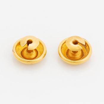 A pair of 18K gold cufflinks set with old-cut diamonds.