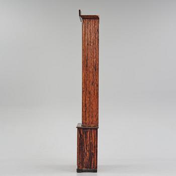 A Swedish faux-boix neo-gothic book cabinet, ca 1830.