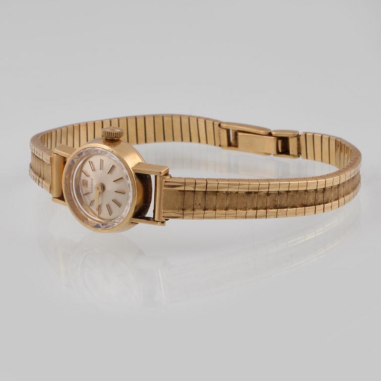 DAMARMBANDSUR, 18K guld, Tissot. Vikt 27,6 gram.