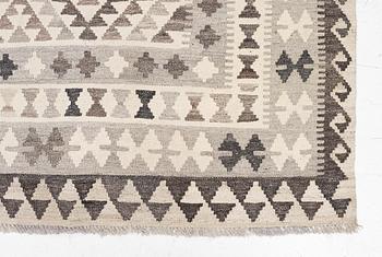 A Kelim carpet, a. 295 x 200 cm.