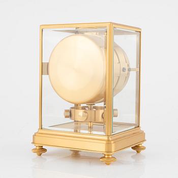 Jaeger LeCoultre, an Atmos table clock.