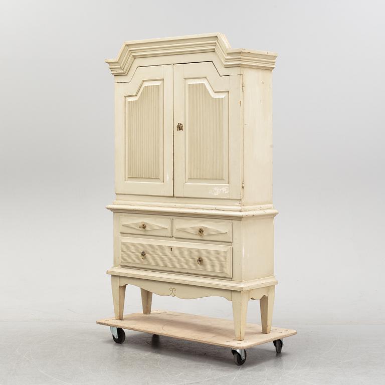 A painted Swedish cabinet, second half of the 18th century and mid 20th century.