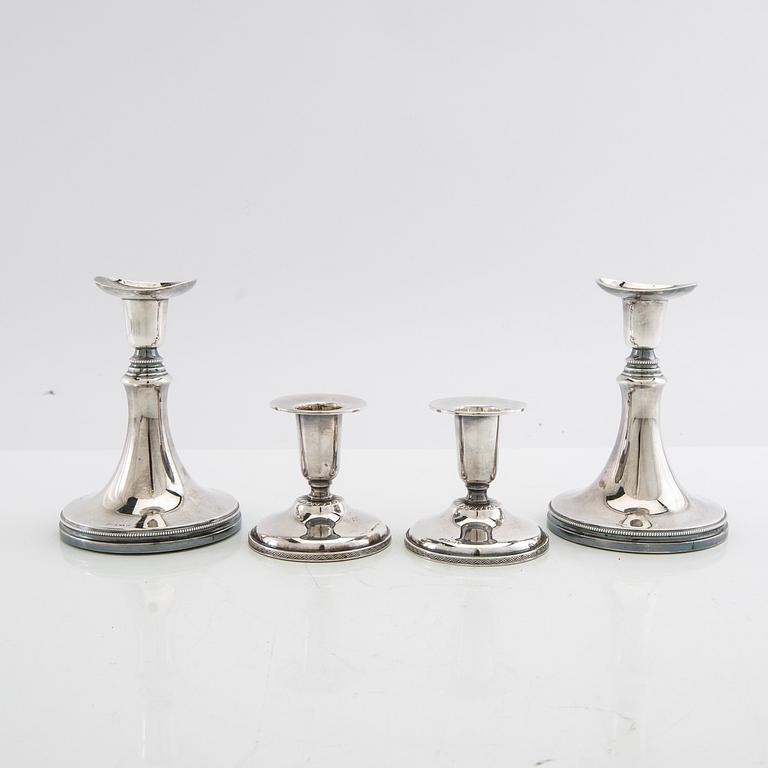 Ljusstakar 2 par silver MGAB Uppsala 1960 samt K&EC Göteborg 1964.