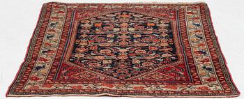 An oriental rug, approx. 148 x 110 cm.