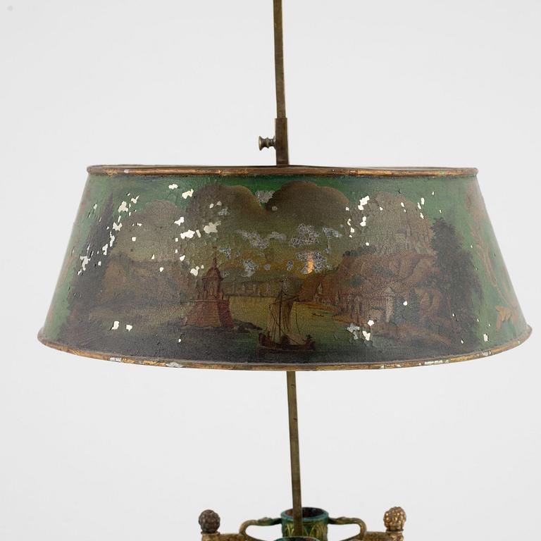 An Empire gilt bronze and tôle-peinte two-light reading lamp, early 19th century.