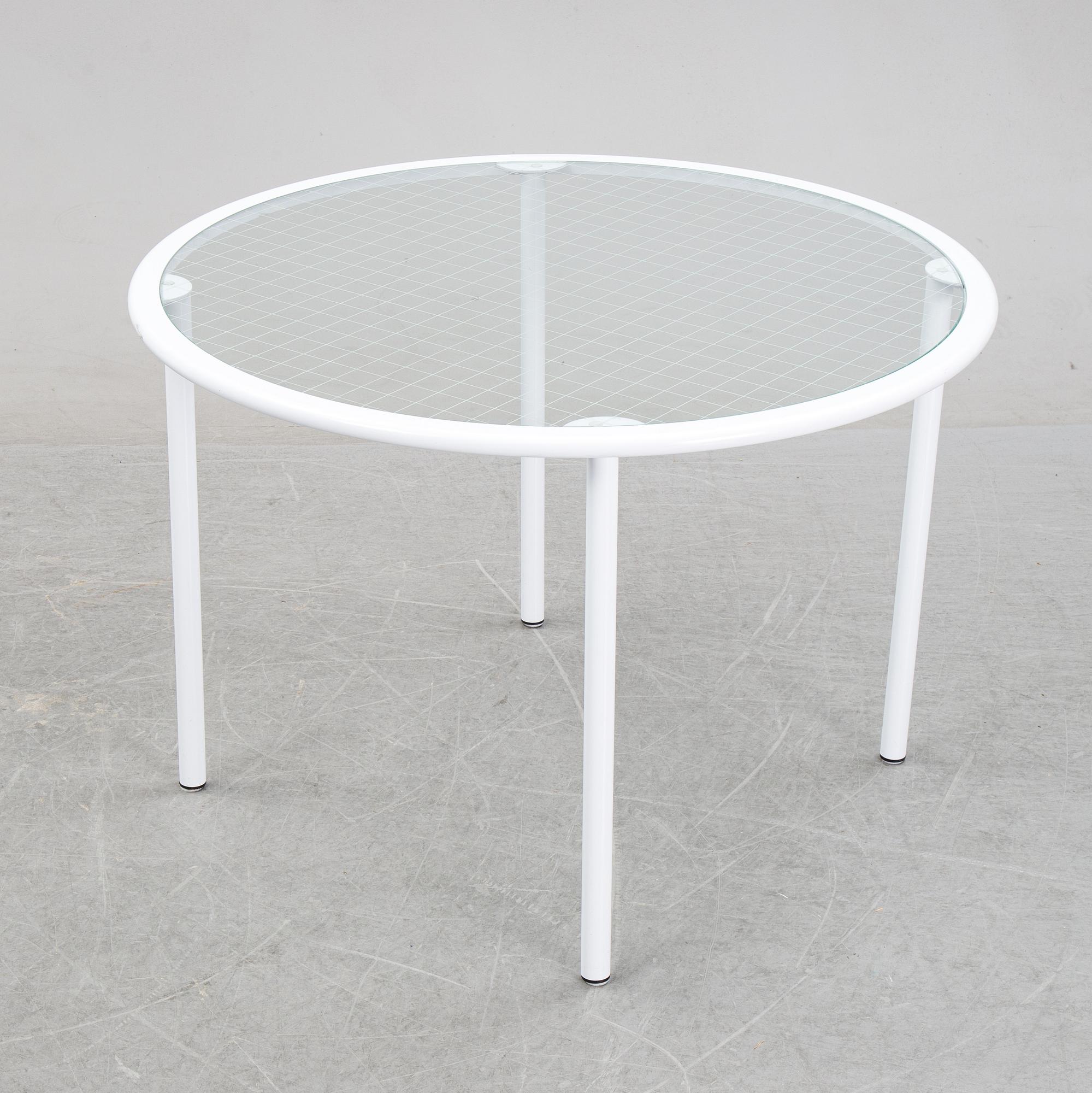 Giandomenico Belotti, attributed to, a griddled glass and metal dining table, by Fly Line, Italy, 1970s.