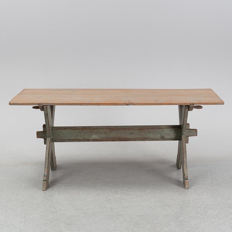 A 19th Century painted pine table.