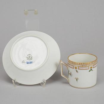 A set of three plus one porcelain "Flora Danica" coffee cups and saucers, "Royal Copenhagen, Denmark.