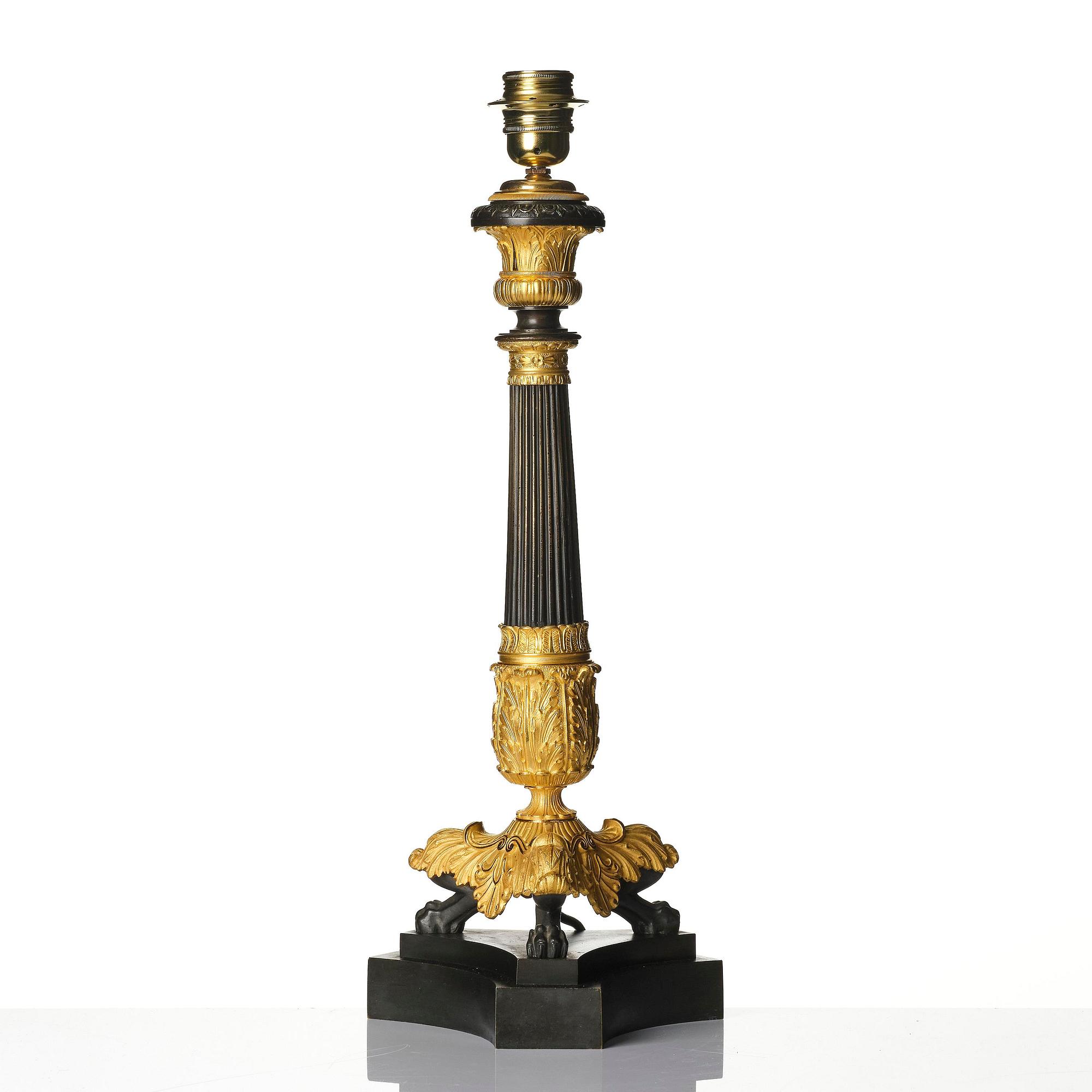 A French Louis Philippe ormolu and patinated bronze lamp, first part 19th century.