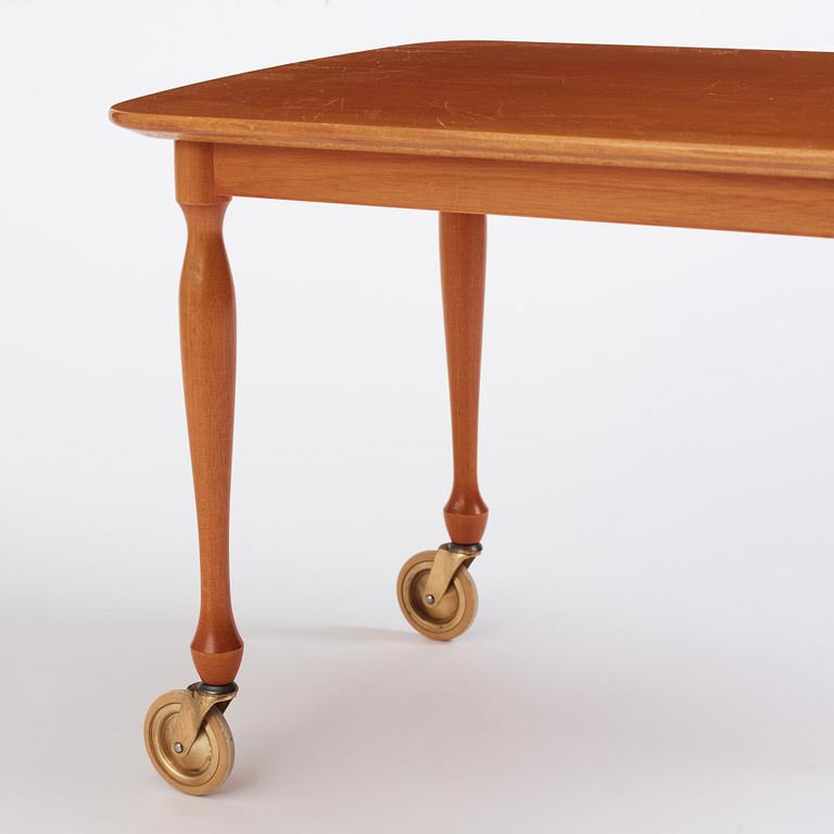 Josef Frank, a mahogany table, model "B 2142", Firma Svenskt Tenn, Sweden 1950s-60s.