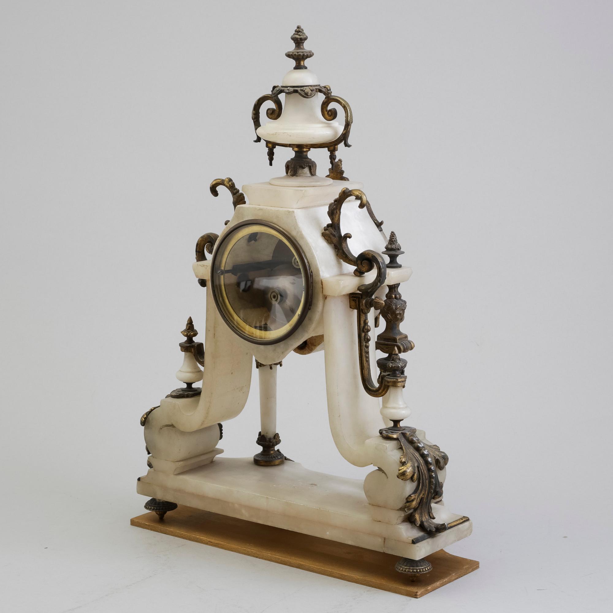 An end of the 19th century alabaster table clock.