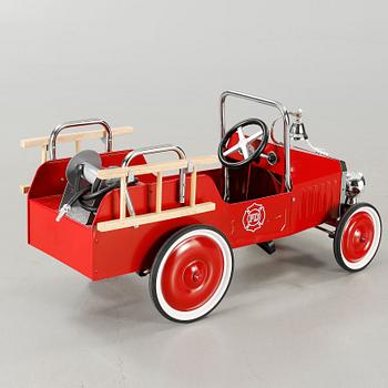 A child´s pedal car from the fourth quarter of the 20th century.
