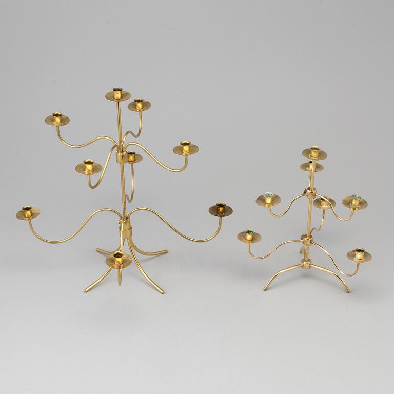 Two brass candelabra, designed by Josef Frank. Firma Svenskt Tenn.