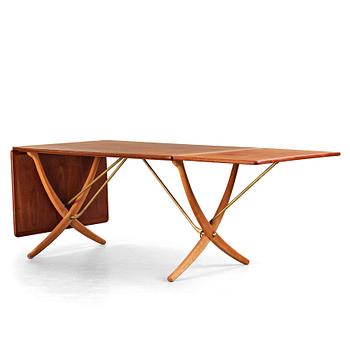 Hans J. Wegner, a teak, beech and brass dining table, model "AT-314", for Andreas Tuck, Denmark 1950-60's.