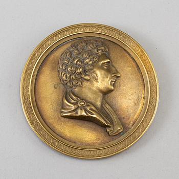 A Swedish Empire portrait medallion depicting Karl XIV Johan, first half 19th ct.