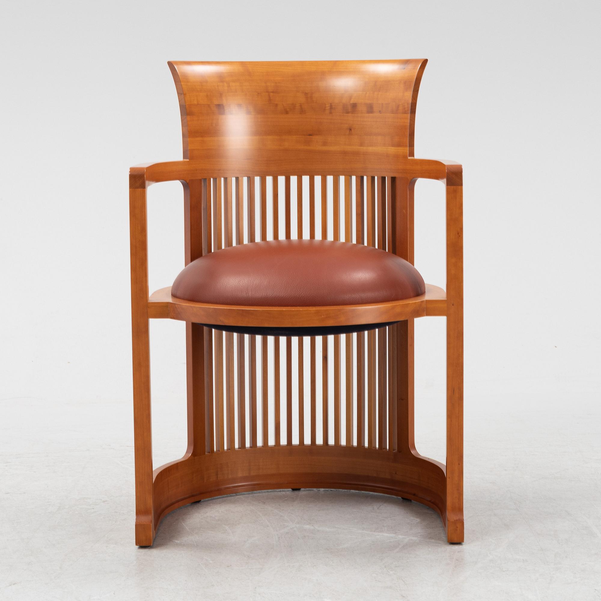 Frank Lloyd Wright, a model 606 'Barrel' chair from Cassina.