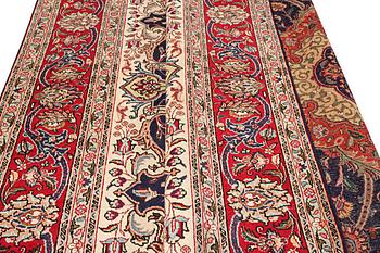 A Tabriz carpet, c. 345 x 255 cm.